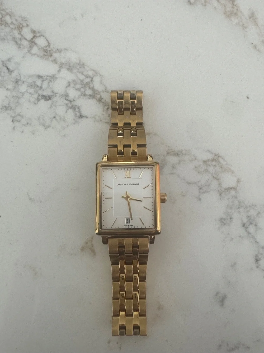 Larson and Jennings Gold Tone Rectangular Watch